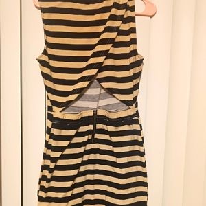 Gianni Bini stripped black and tan fitted mini dress in size large.